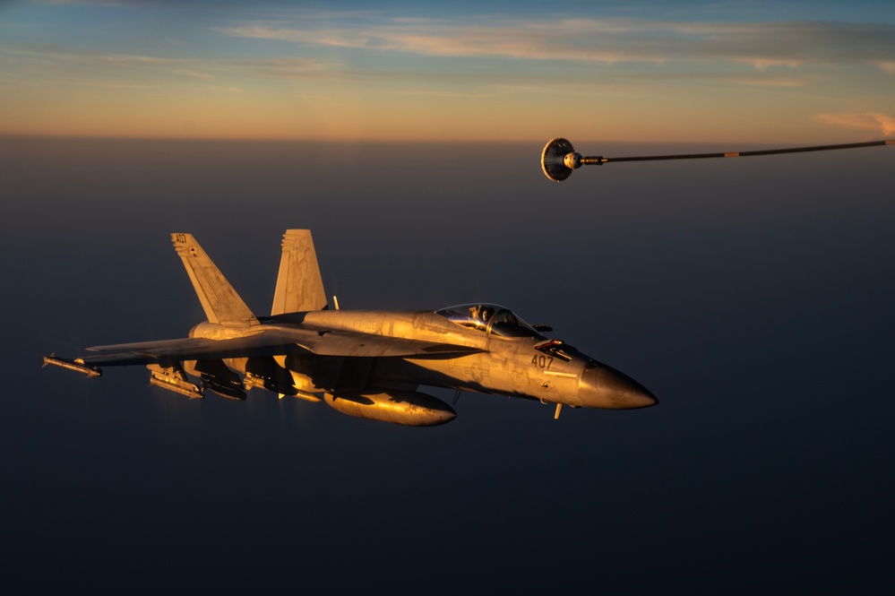 KC-135 refuels U.S. Navy Fighters in U.S. Central Command