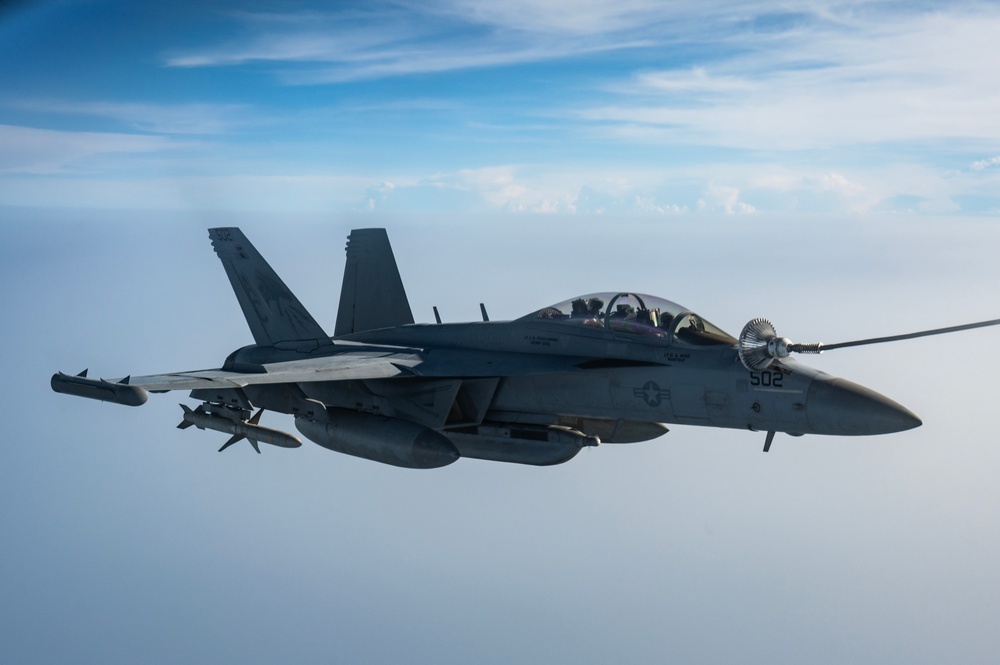 KC-135 refuels U.S. Navy Fighters in U.S. Central Command