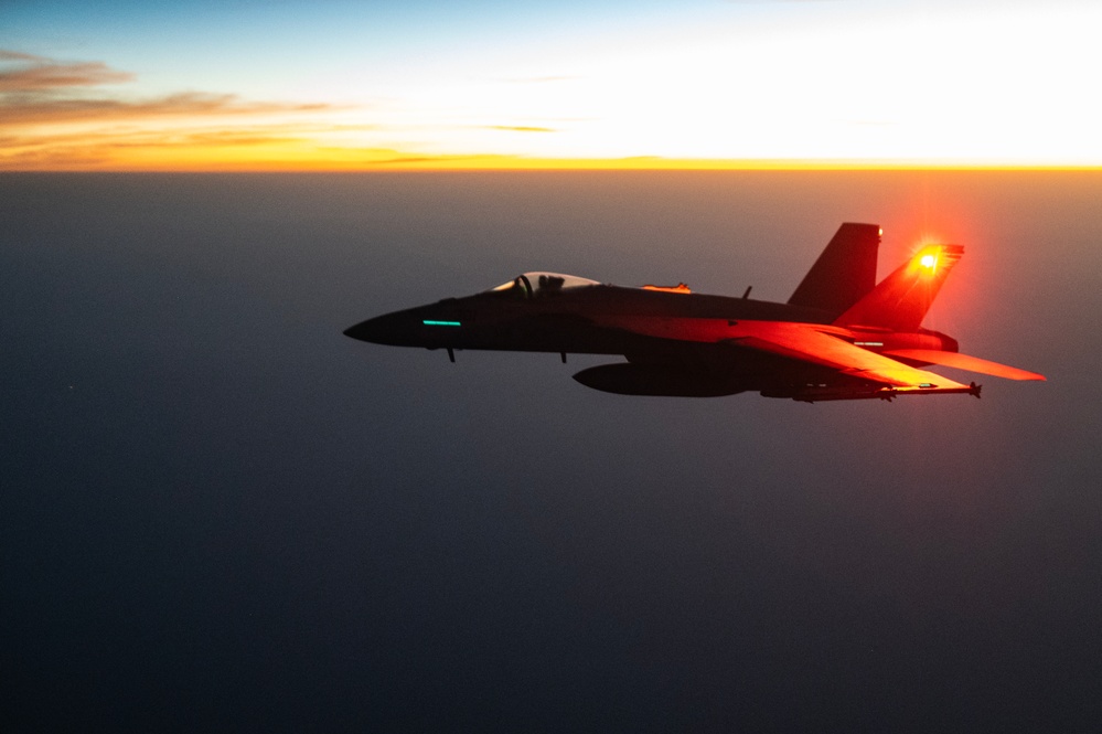 KC-135 refuels U.S. Navy Fighters in U.S. Central Command