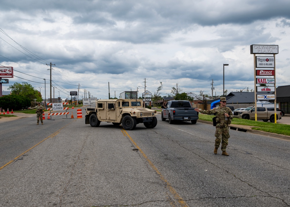 Guardsmen Direct Traffic Through Tornado Damage