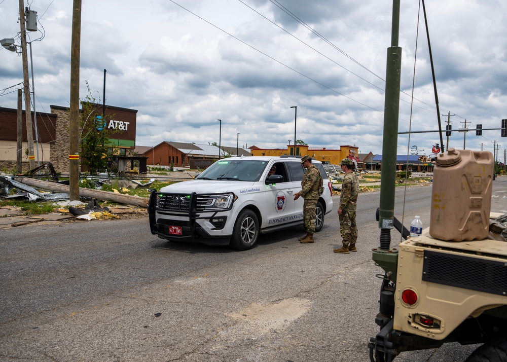 Guardsmen Direct Traffic Through Tornado Damage