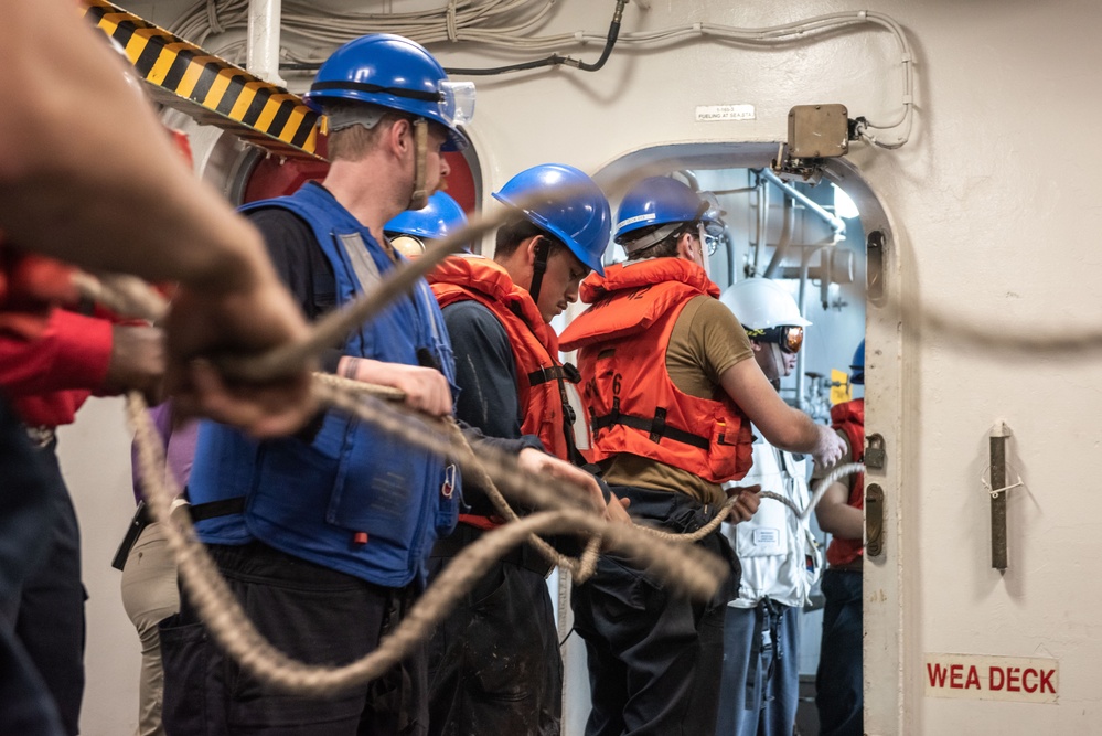 USS Ronald Reagan (CVN 76) conducts a fueling-at-sea with USNS John Ericsson (T-AO 194)