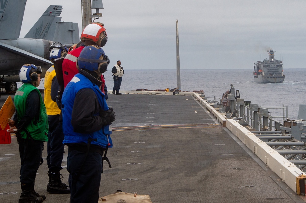 USS Ronald Reagan (CVN 76) conducts a fueling-at-sea with USNS John Ericsson (T-AO 194)
