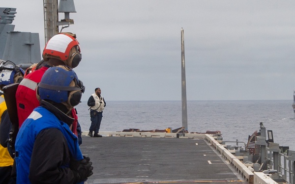 USS Ronald Reagan (CVN 76) conducts a fueling-at-sea with USNS John Ericsson (T-AO 194)