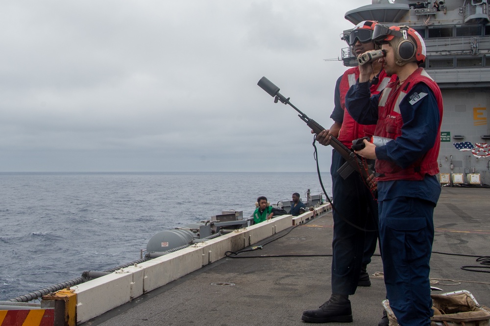 USS Ronald Reagan (CVN 76) conducts a fueling-at-sea with USNS John Ericsson (T-AO 194)