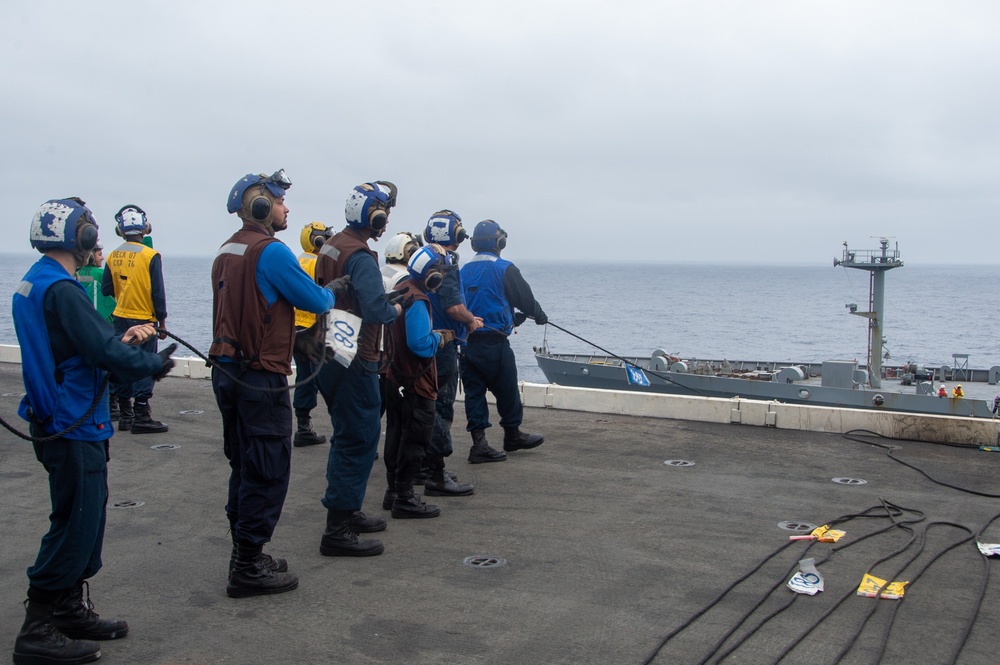 USS Ronald Reagan (CVN 76) conducts a fueling-at-sea with USNS John Ericsson (T-AO 194)