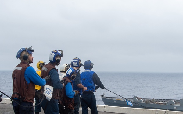 USS Ronald Reagan (CVN 76) conducts a fueling-at-sea with USNS John Ericsson (T-AO 194)