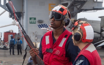 USS Ronald Reagan (CVN 76) conducts a fueling-at-sea with USNS John Ericsson (T-AO 194)