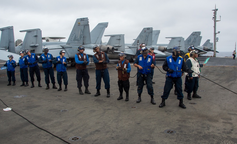 USS Ronald Reagan (CVN 76) conducts a fueling-at-sea with USNS John Ericsson (T-AO 194)