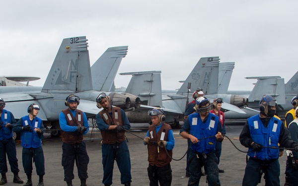 USS Ronald Reagan (CVN 76) conducts a fueling-at-sea with USNS John Ericsson (T-AO 194)