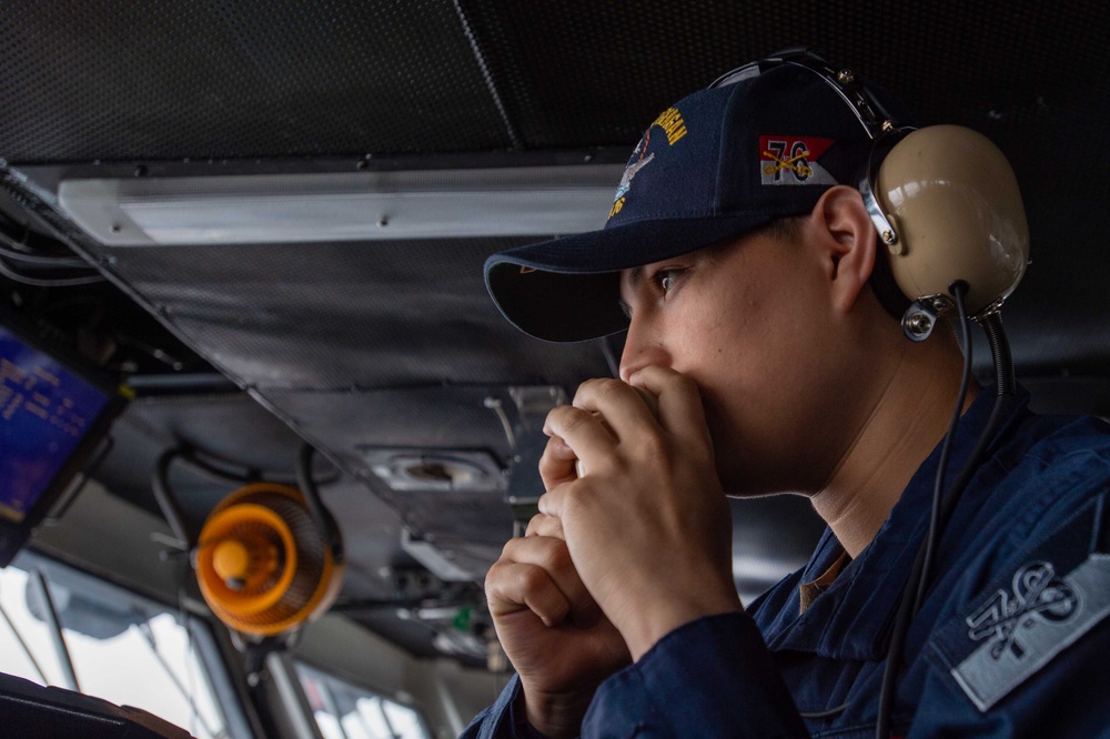 USS Ronald Reagan (CVN 76) Sailors stand watch in the pilot house