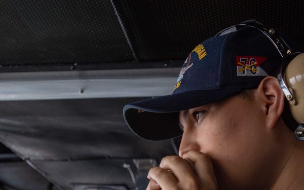 USS Ronald Reagan (CVN 76) Sailors stand watch in the pilot house