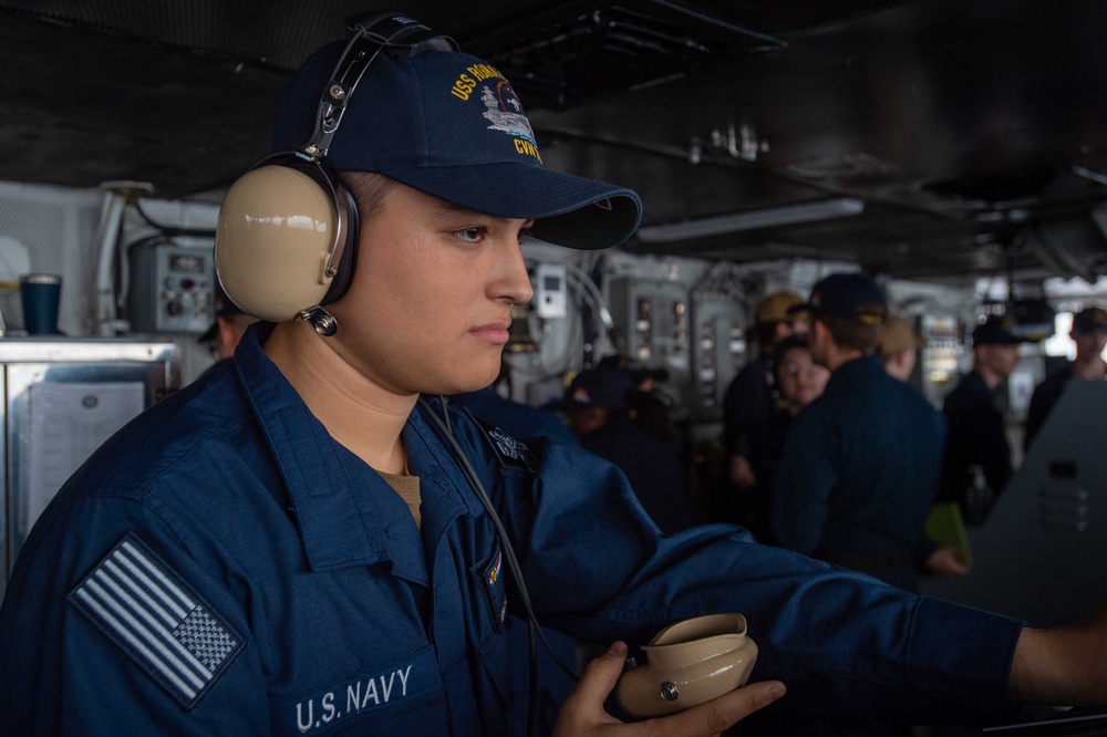 USS Ronald Reagan (CVN 76) Sailors stand watch in the pilot house