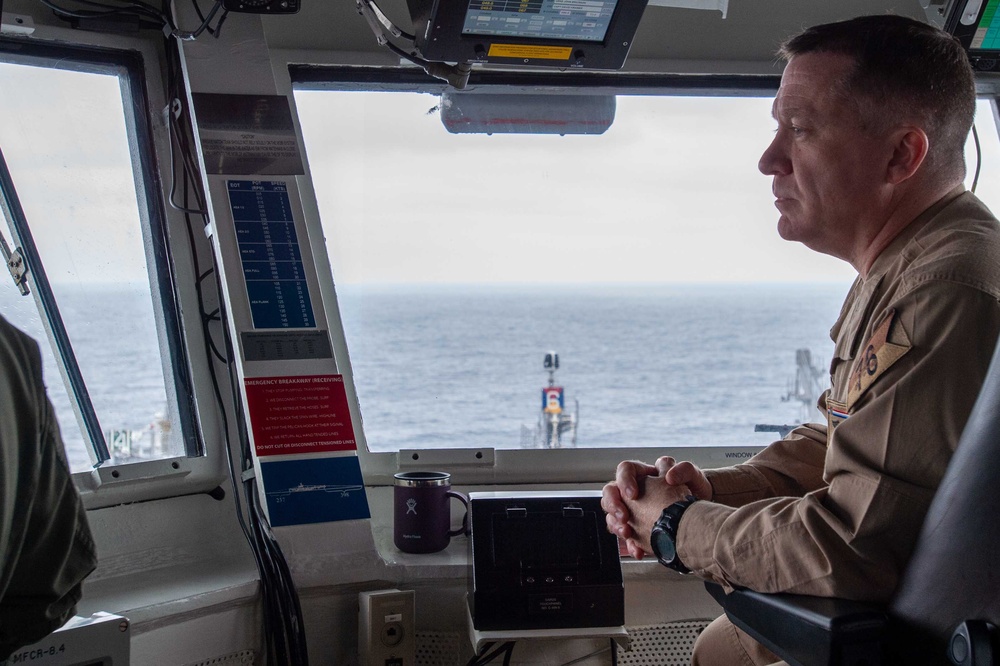 Headline: USS Ronald Reagan (CVN 76) Sailors stand watch in the pilot house