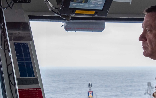 Headline: USS Ronald Reagan (CVN 76) Sailors stand watch in the pilot house