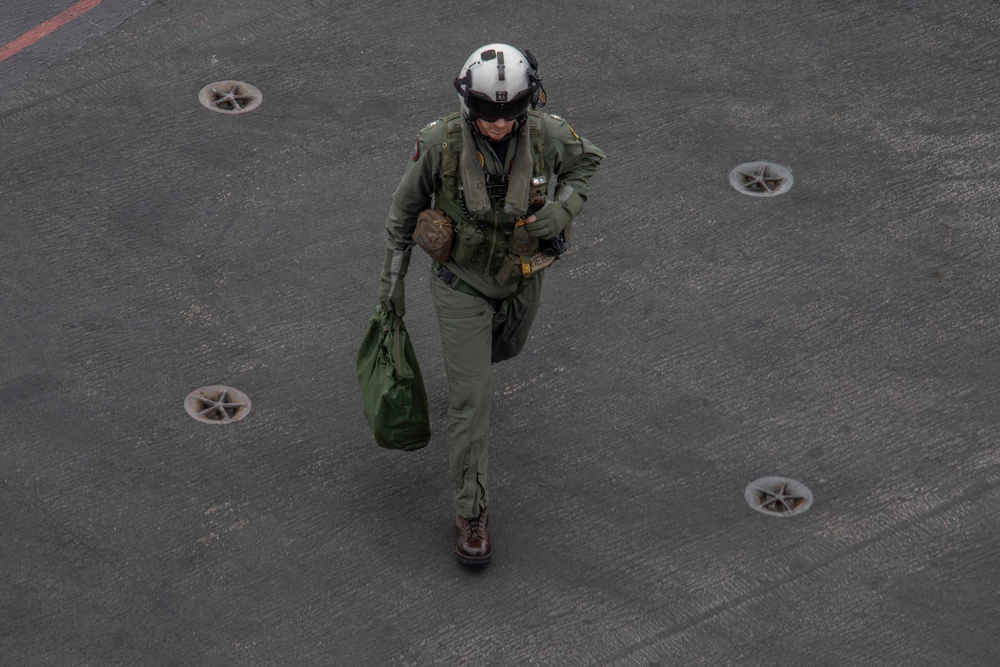 Capt. Pete Riebe participates in helicopter operations aboard Abraham Lincoln