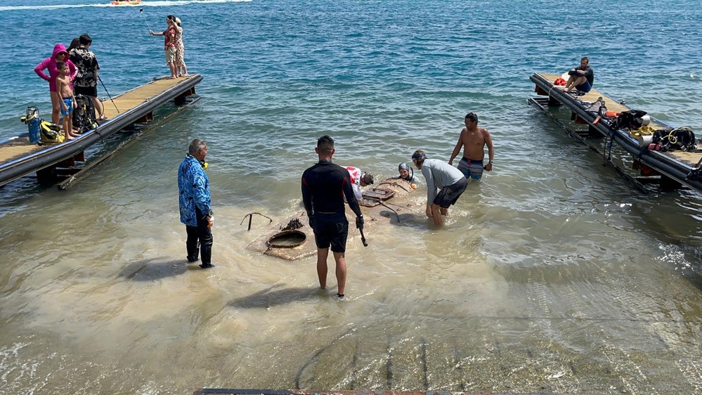 Volunteers conduct Merizo Pier underwater clean up