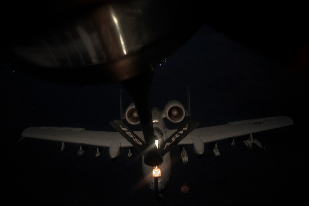 KC-135 refuels A-10s