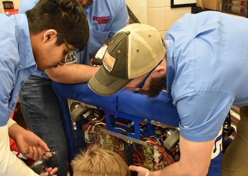 EOD Airman fuels local high school’s robotics team