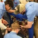 EOD Airman fuels local high school’s robotics team