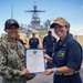 240601 – HM3 Biag Reenlists Aboard USS Harpers Ferry