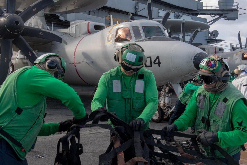 USS Ronald Reagan (CVN 76) conducts a vertical replenishment-at-sea with USNS John Ericsson (T-AO 194)