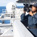 USS Ronald Reagan (CVN 76) Sailors stand watch in the pilot house  during a vertical replenishment-at-sea with USNS John Ericsson (T-AO 194)