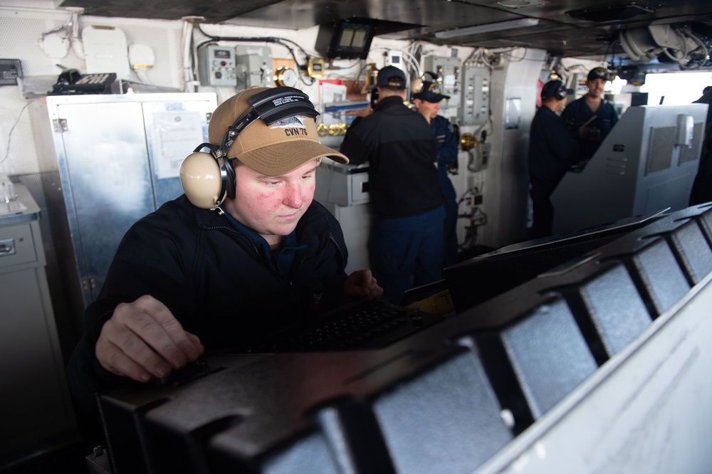 USS Ronald Reagan (CVN 76) Sailors stand watch in the pilot house  during a vertical replenishment-at-sea with USNS John Ericsson (T-AO 194)