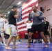 USS Ronald Reagan (CVN 76) Sailors participate  in a fitness session with Vitor Belfort