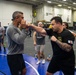 USS Ronald Reagan (CVN 76) Sailors participate  in a fitness session with Vitor Belfort