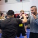 USS Ronald Reagan (CVN 76) Sailors participate  in a fitness session with Vitor Belfort