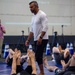 USS Ronald Reagan (CVN 76) Sailors warm up before a fitness session with Vitor Belfort
