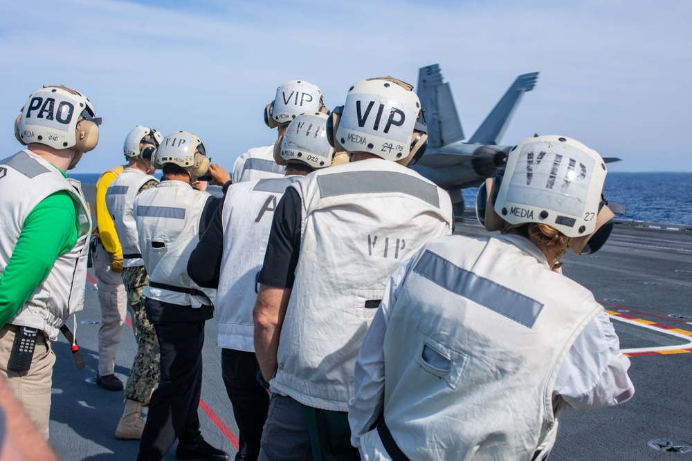 USS Ronald Reagan (CVN76) hosts ship tour for  Dr. Mike Gervais and resiliency team