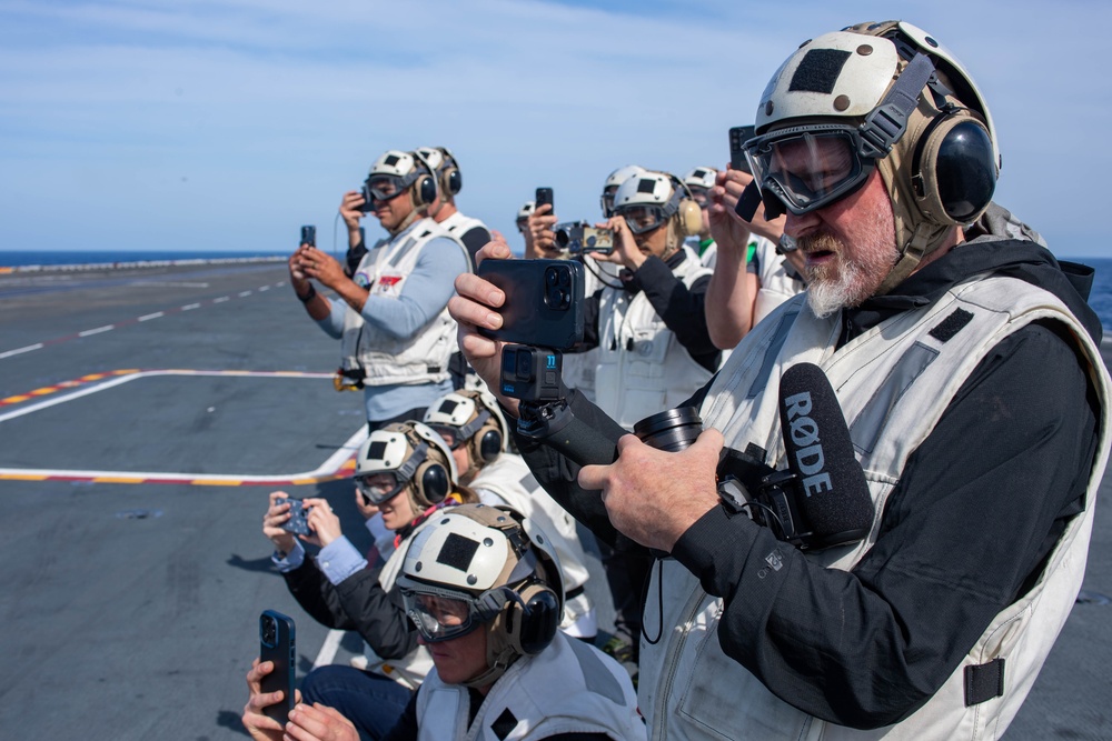 USS Ronald Reagan (CVN76) hosts ship tour for  Dr. Mike Gervais and resiliency team