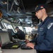 USS Ronald Reagan (CVN 76) Sailors stand watch in the pilot house