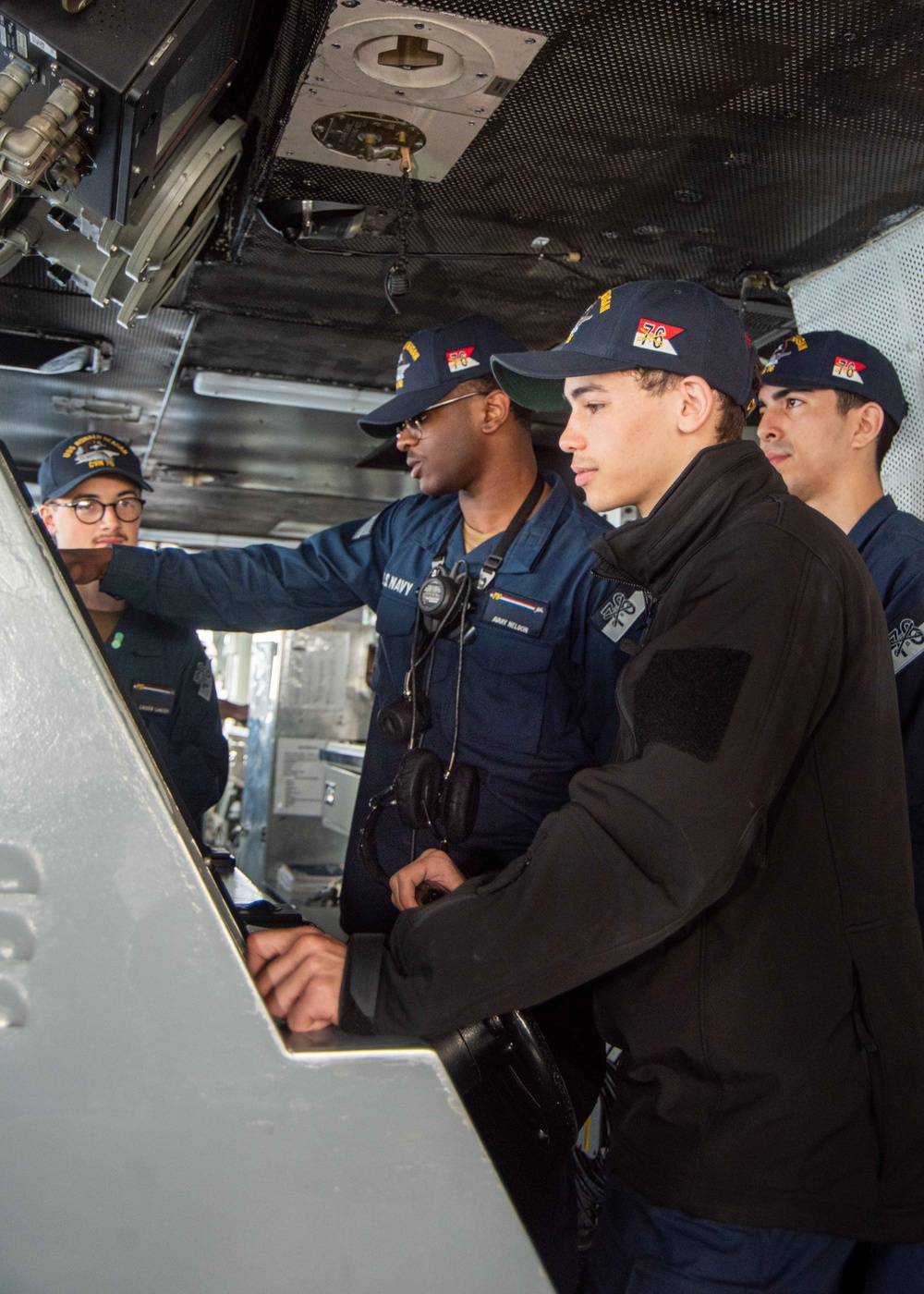 USS Ronald Reagan (CVN 76) Sailors stand watch in the pilot house