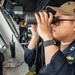 USS Ronald Reagan (CVN 76) Sailors stand watch in the pilot house