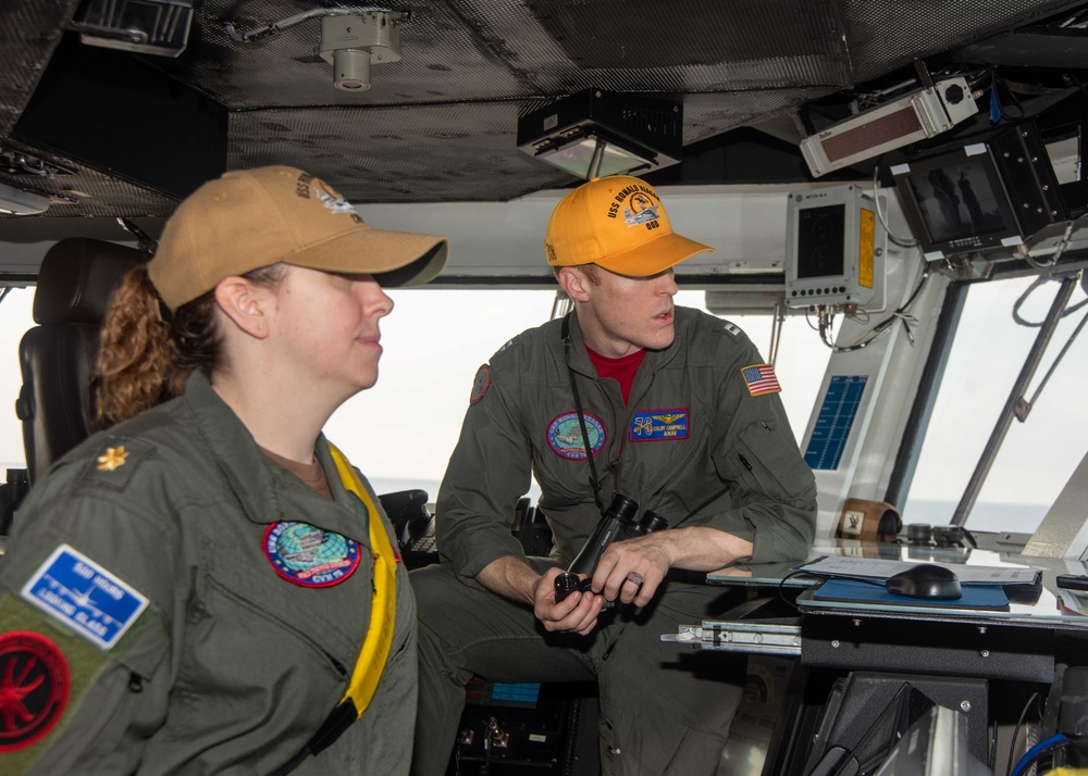 USS Ronald Reagan (CVN 76) Sailors stand watch in the pilot house