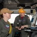 USS Ronald Reagan (CVN 76) Sailors stand watch in the pilot house