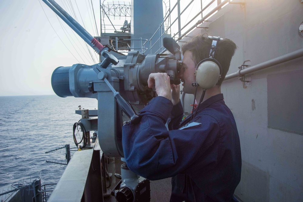 USS Ronald Reagan (CVN 76) Sailors stand watch in the pilot house