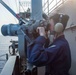 USS Ronald Reagan (CVN 76) Sailors stand watch in the pilot house