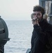 USS Ronald Reagan (CVN 76) Sailors stand watch in the pilot house