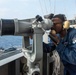 USS Ronald Reagan (CVN 76) Sailors stand watch in the pilot house