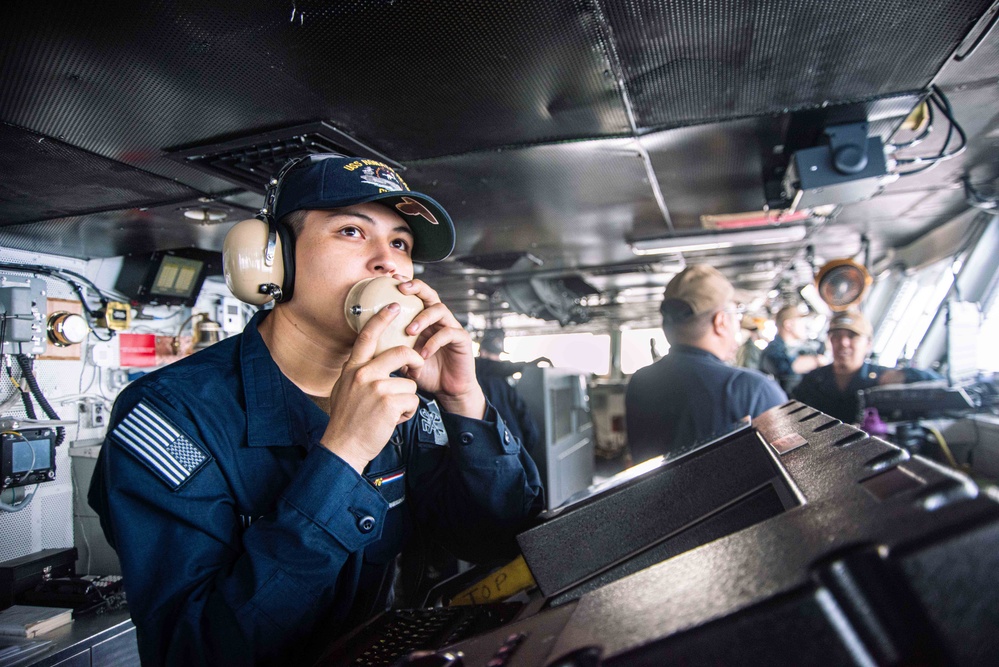 USS Ronald Reagan (CVN 76) Sailors stand watch in the pilot house