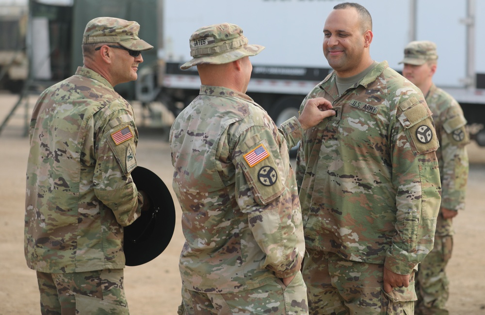 Jeramie Haney of D Troop, 278th RSS, receives the rank captain