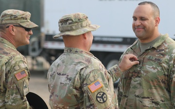 Jeramie Haney of D Troop, 278th RSS, receives the rank captain
