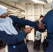 USS Ronald Reagan (CVN 76) Sailors attend stretcher bearer training during general quarters drill