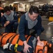 USS Ronald Reagan (CVN 76) Sailors attend stretcher bearer training during general quarters drill