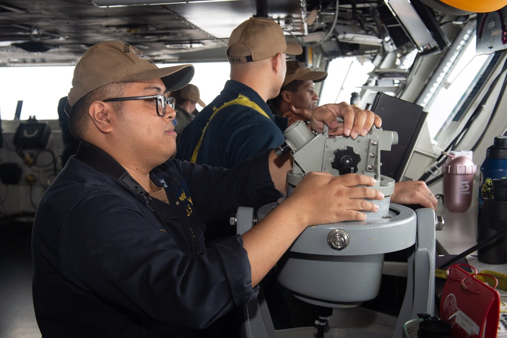 USS Ronald Reagan (CVN 76) Sailors stand  watch in the pilot house