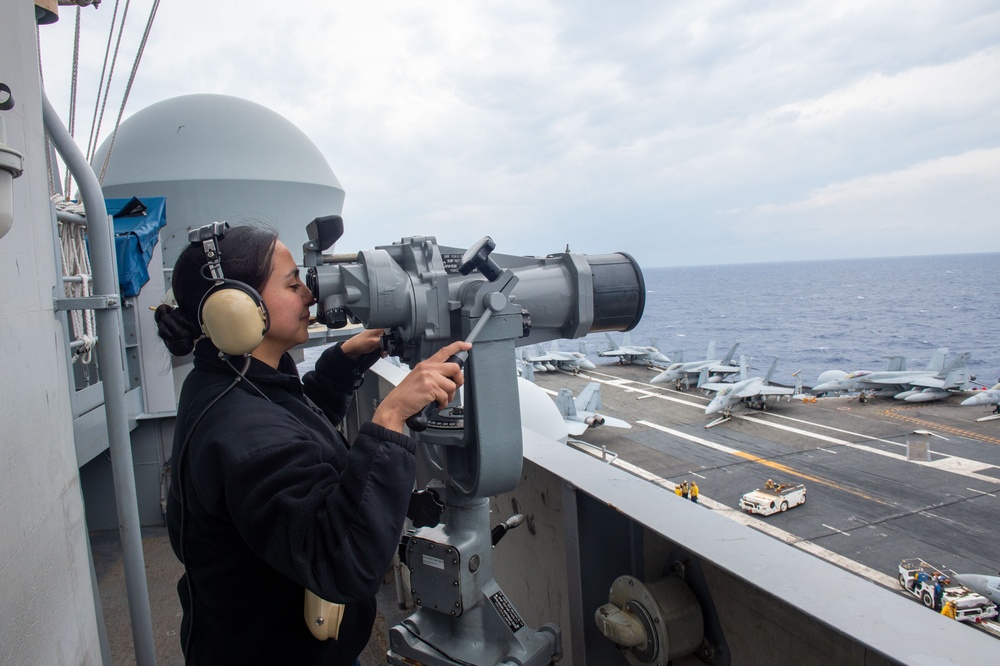 USS Ronald Reagan (CVN 76) Sailors stand  watch in the pilot house